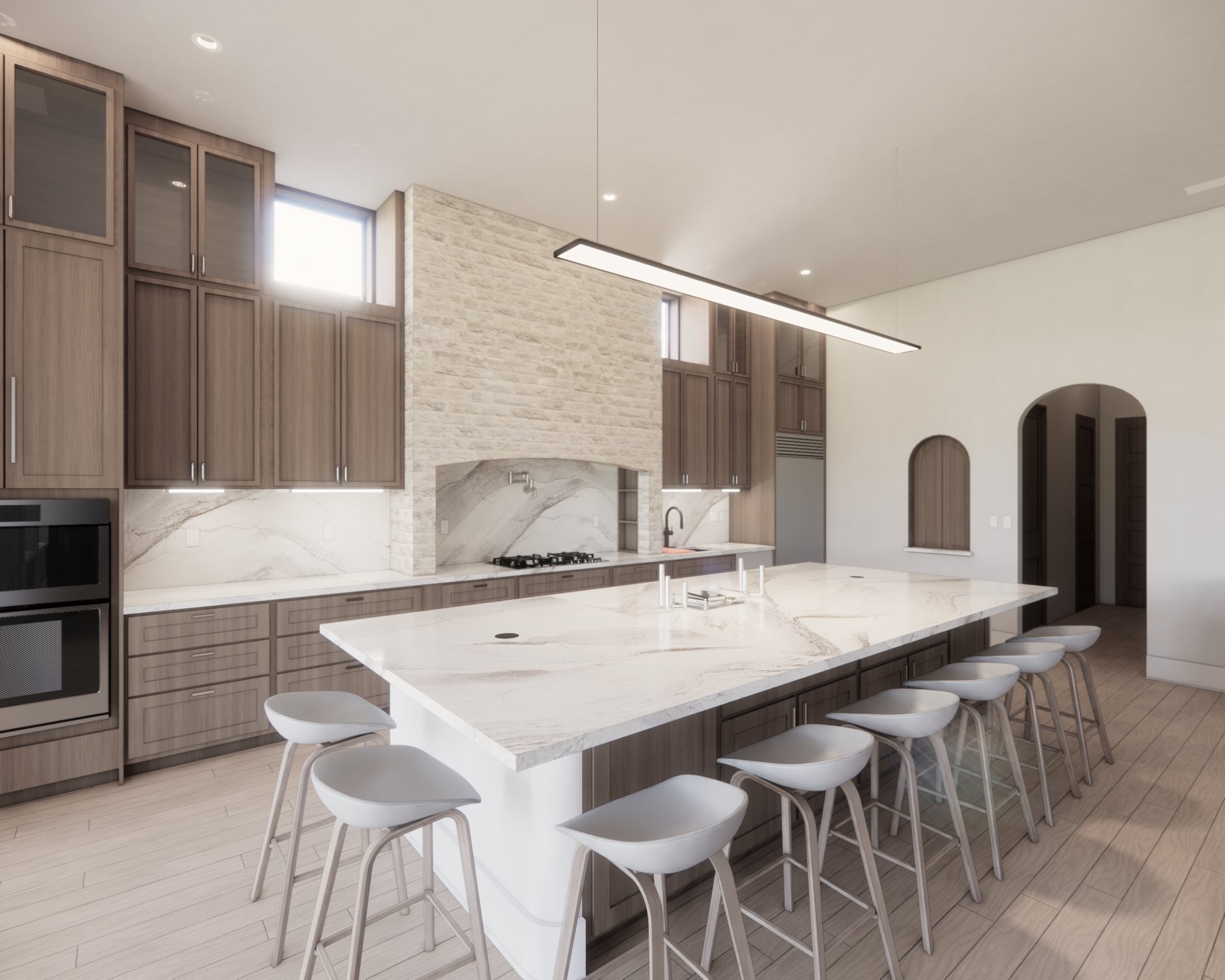 Kitchen with walnut shaker cabinetry, a stacked-stone range hood with an arched marble niche, and a long marble island with eight stools